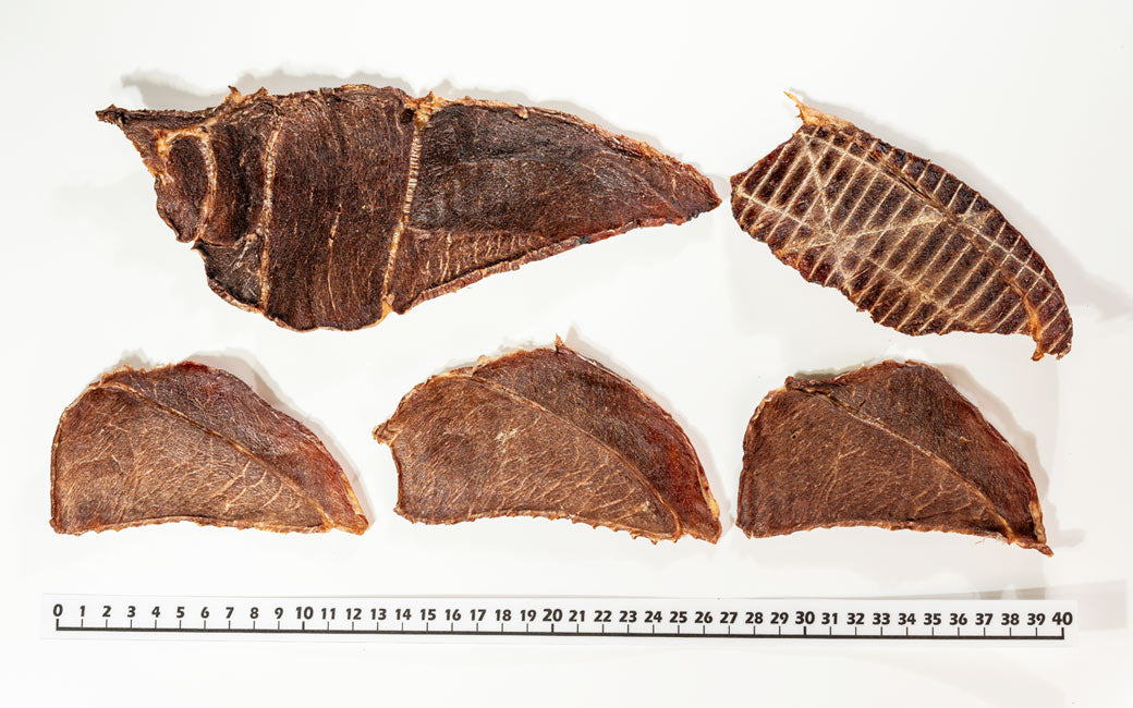 Close-up of Air Dried Camel Jerky showing the natural texture of this novel protein dog treats. High protein, naturally low cholesterol, a healthy air-dried treat from Michinoku Farm Japan