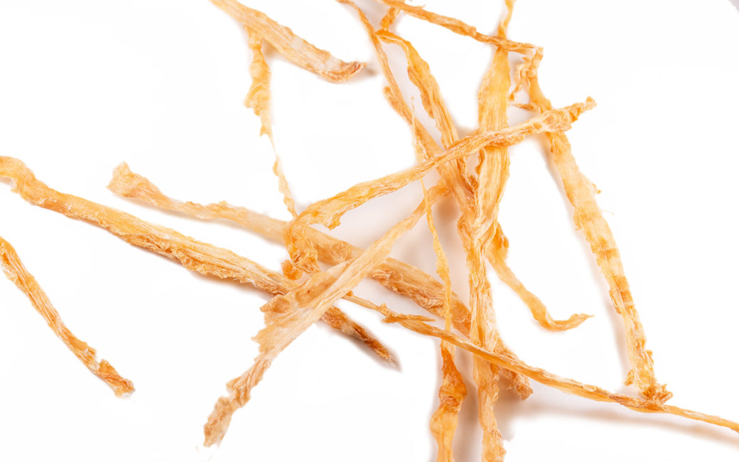 Close-up of Air Dried Turkey Achilles showing the natural texture of this freeze dried turkey. Long-lasting chew, promotes dental health, a healthy air-dried treat from Michinoku Farm Japan
