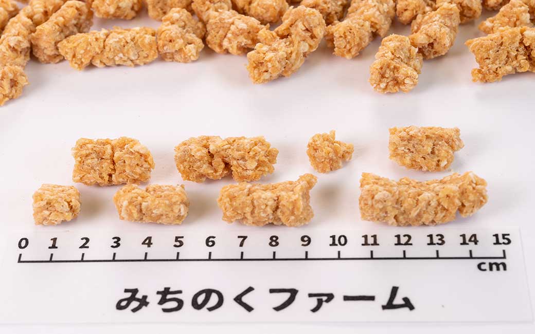 Close-up of Air Dried Crunchy Chicken Tender showing the natural texture of this chicken tender dog treats. High protein, low-fat daily snack, a healthy air-dried treat from Michinoku Farm Japan