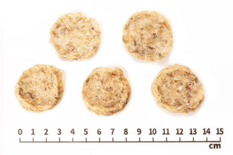 Air Dried Cod Chips pieces served out of the pouch, no artificial additives, wholesome fish treat. A natural cod for dogs treat for dogs and cats from Michinoku Farm Singapore