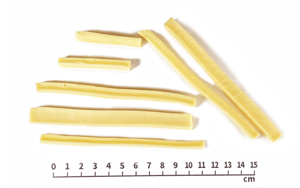 Air Dried Cheese Stick pieces served out of the pouch, no artificial additives, preservatives, coloring. A natural cheese dog treats treat for dogs and cats from Michinoku Farm Singapore