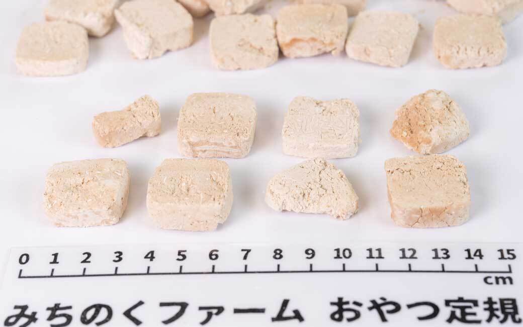 Back of the Freeze Dried Chicken Meat Cookie pouch showing full ingredient list and feeding details, functional dog treats from Michinoku Farm Japan