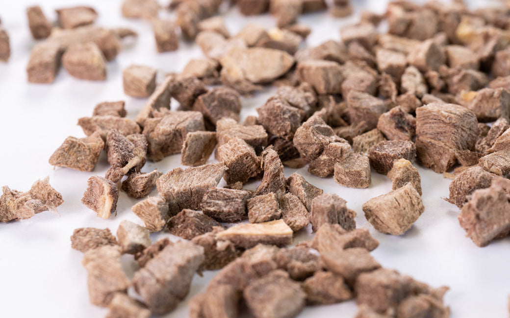 Close-up of Freeze Dried Horse Meat (Small Cubes) showing the natural texture of this freeze dried horse. Soft cubes, easy for small dogs, a healthy freeze-dried treat from Michinoku Farm Japan