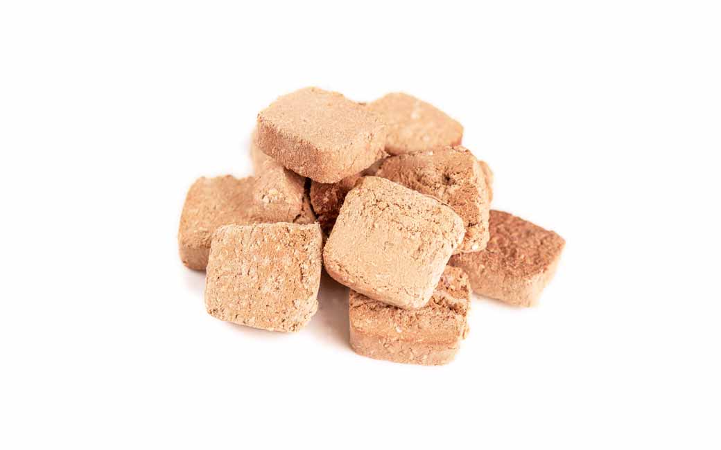Close-up of Freeze Dried Venison Meat Cookie showing the light, crispy texture of this novel protein dog treats. Gluten-free, easy to break, a healthy treat from Michinoku Farm Japan