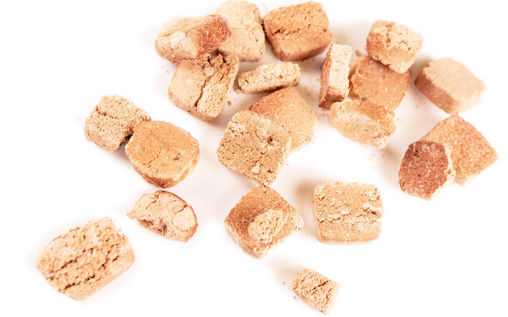 Freeze Dried Venison Meat Cookie pieces served out of the pouch, can be crushed into a meal topper. A natural venison dog treats for dogs and cats from Michinoku Farm Singapore