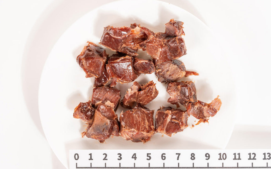 Close-up of Retort Kangaroo showing the natural texture of this freeze dried kangaroo. Naturally low-fat, novel protein option, a healthy retort treat from Michinoku Farm Japan